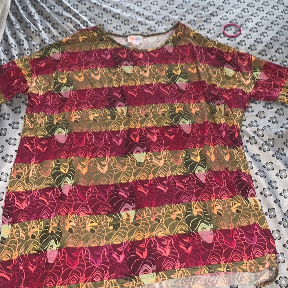 It’s a small but fits like a medium! Maleficent Disney print.